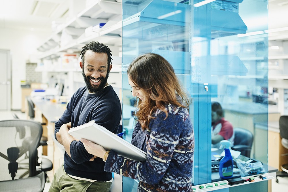 Man and woman in office discussion