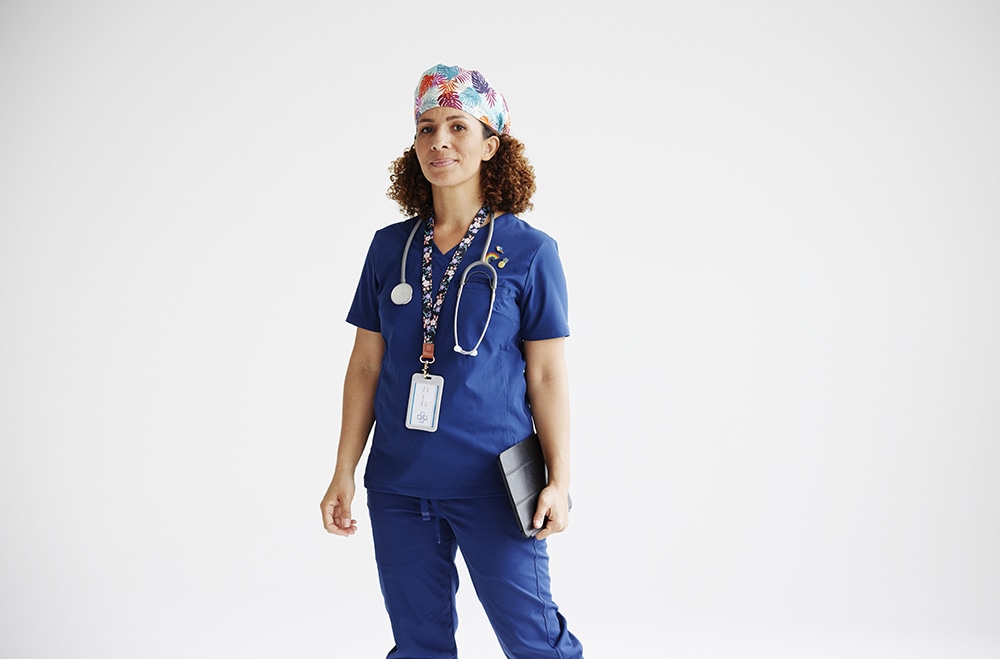 Doctor in blue standing