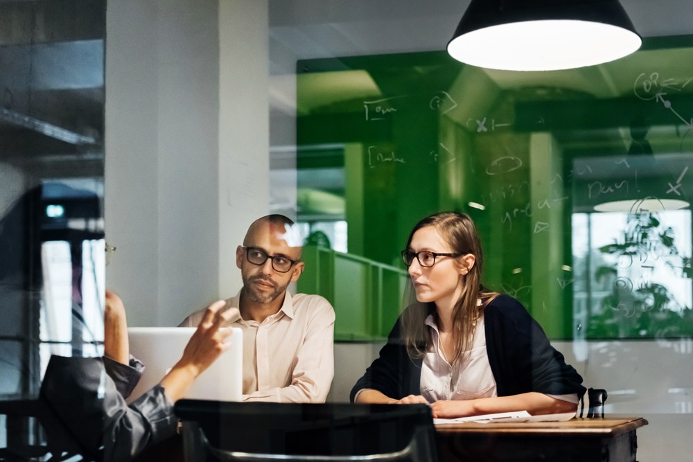 Man and woman in team meeting