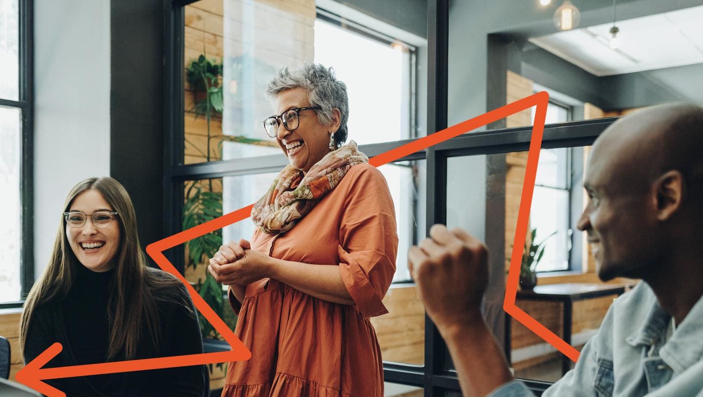 People laughing in a professional office setting