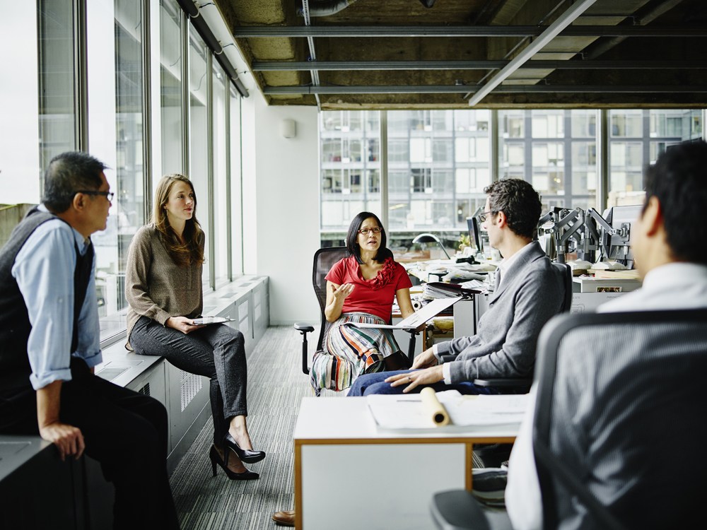 Employees in team meeting