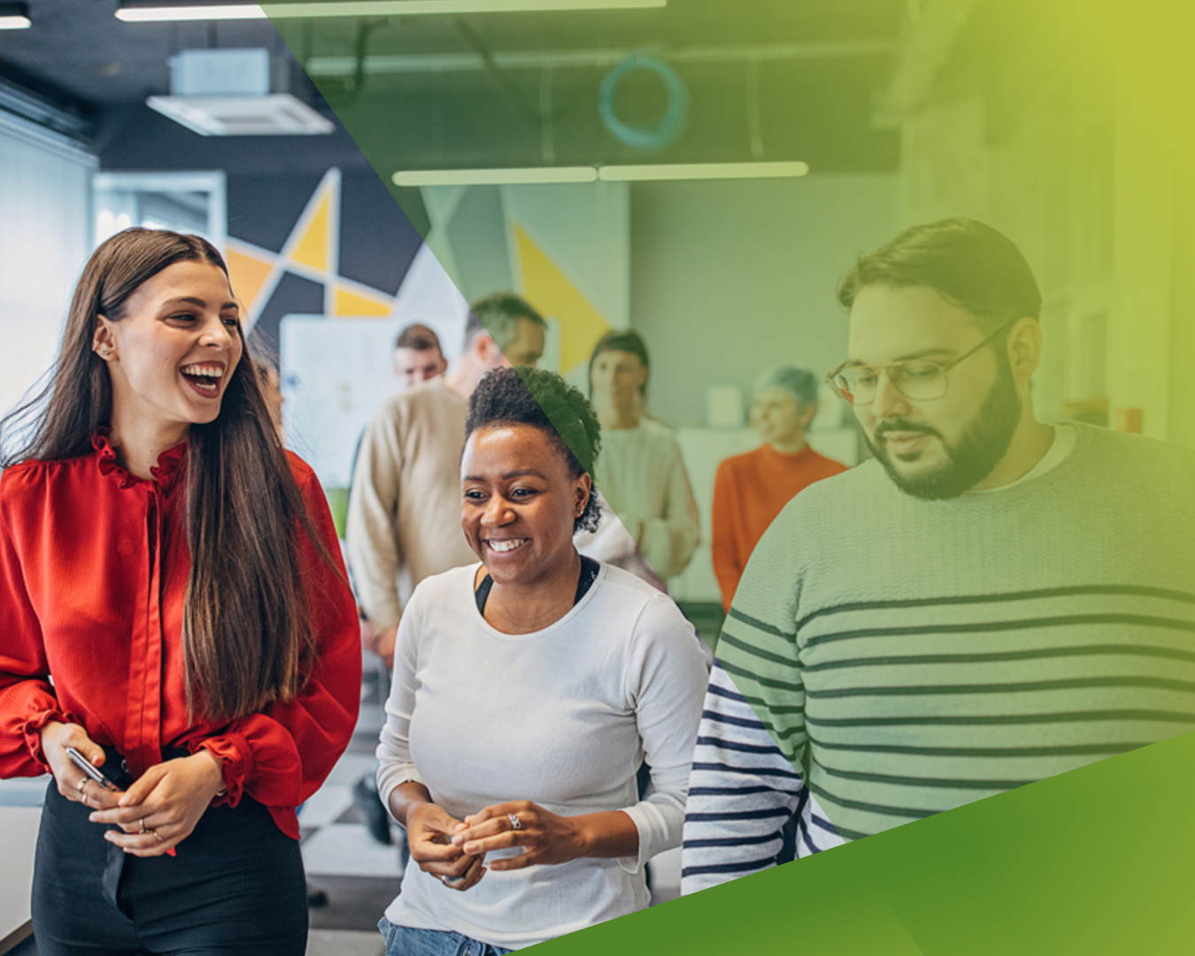 three employees walking through office together, laughing. Green NAVEX arrow hue over bottom right corner